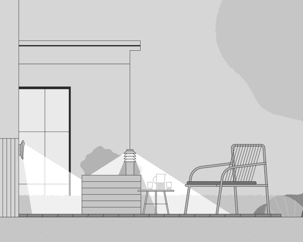 A PH 3-2½ Outdoor Wall Lamp and PH 3-2½ Bollard illuminate a modern rooftop terrace with outdoor furniture. © 2026 Louis Poulsen.