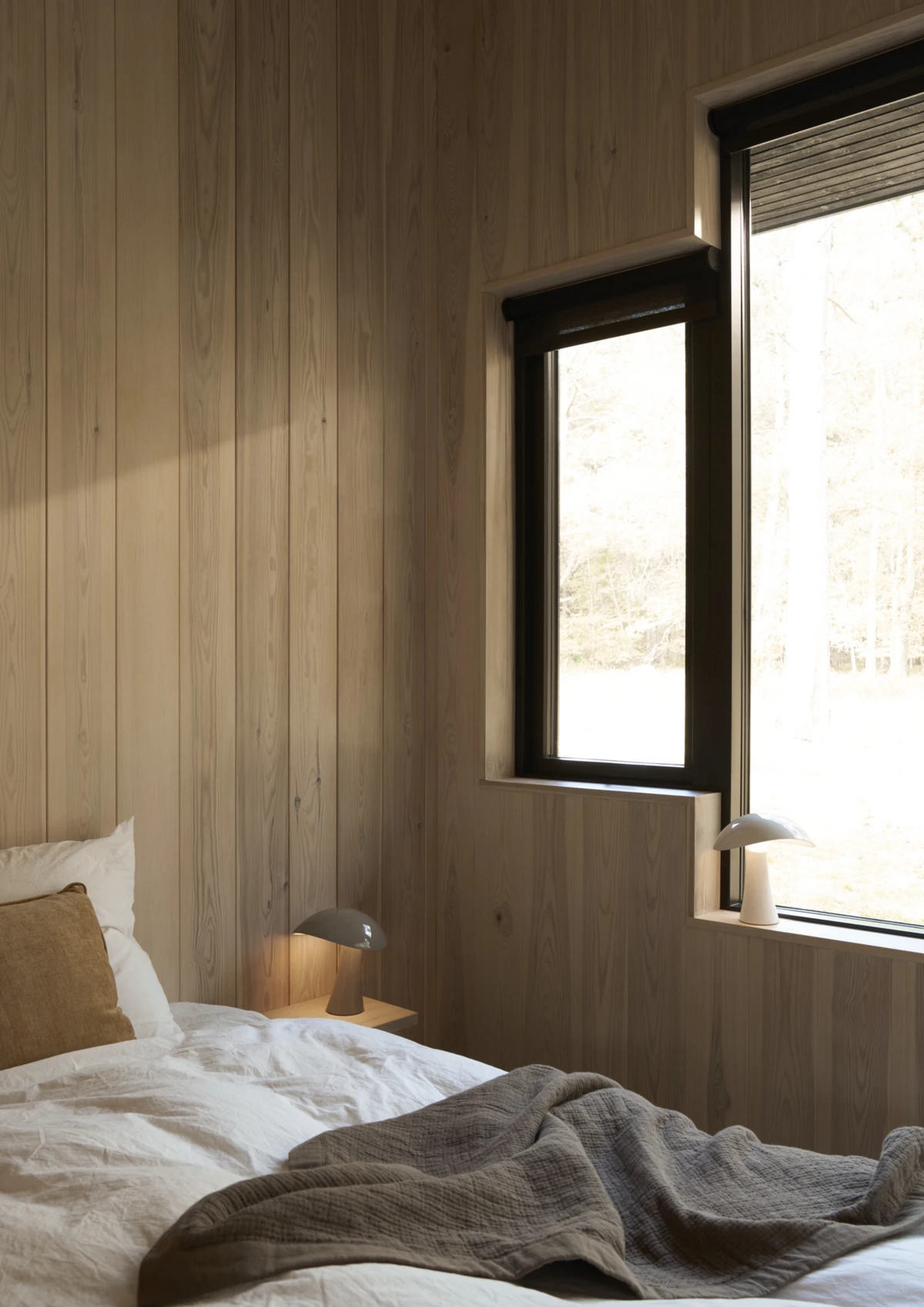 Rumee Portable Lamp in a bedroom setting
