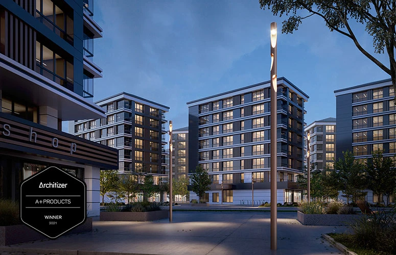 Flindt Plaza post lights illuminate a plaza among modern apartment buildings at dusk. © 2026 Louis Poulsen.