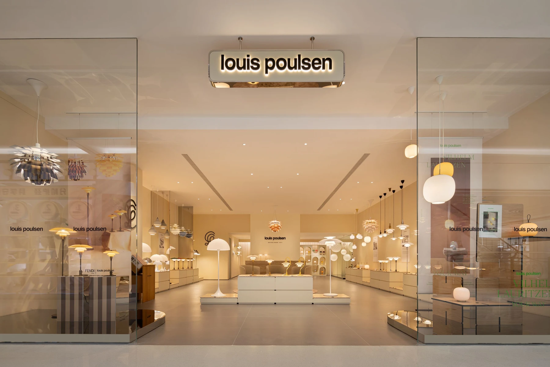 Exterior view of the Louis Poulsen store at Hangzhou Tower in China showcasing lighting displays, © 2025 Louis Poulsen.