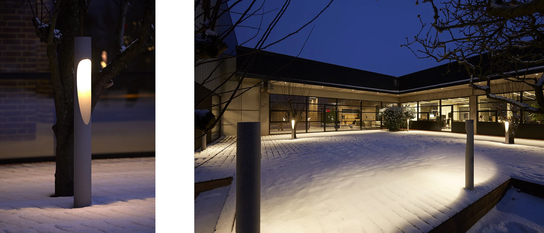 Flindt Bollards illuminate a snow-covered courtyard outside a modern office building at dusk. © 2026 Louis Poulsen.